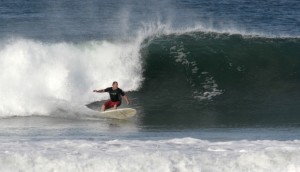 baja_bill baja bill laying into a bottom turn